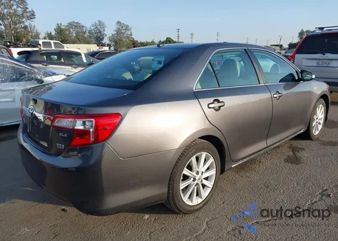 2014 Toyota Camry Hybrid Xle z USA, uszkodzony, nr VIN 4T1BD1FK6EU100773